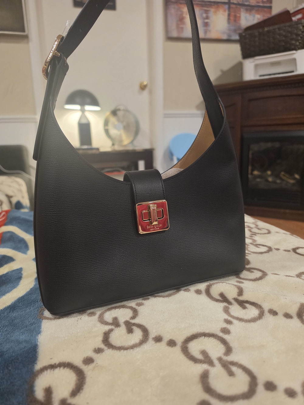 Kate Spade Black Leather Shoulder Bag with Gold-Tone Hardware